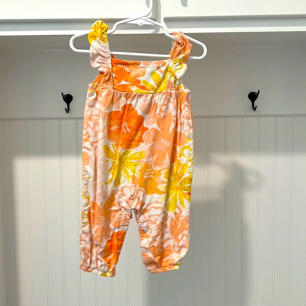 6mo romper . Spring floral pattern. Stain free. Smoke free home